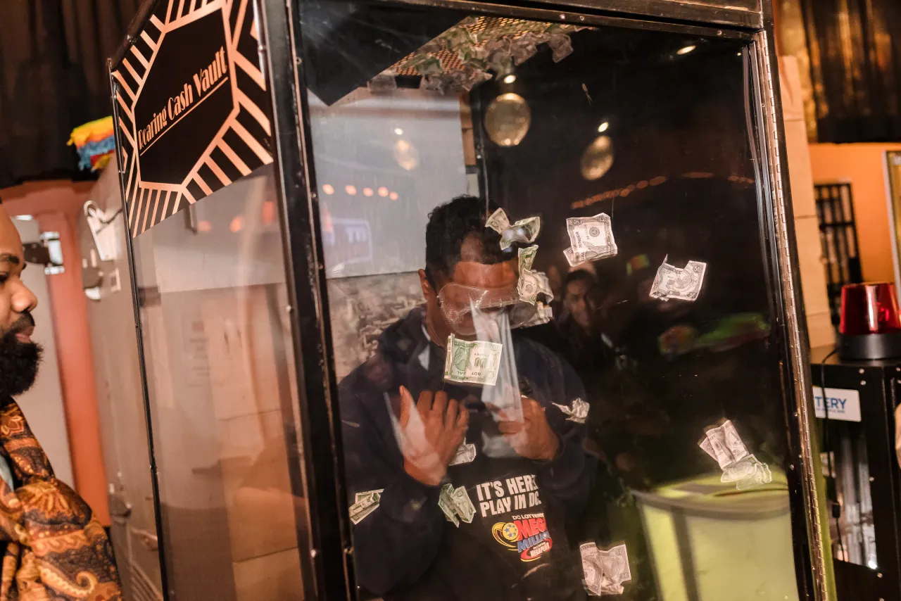 Man in money machine