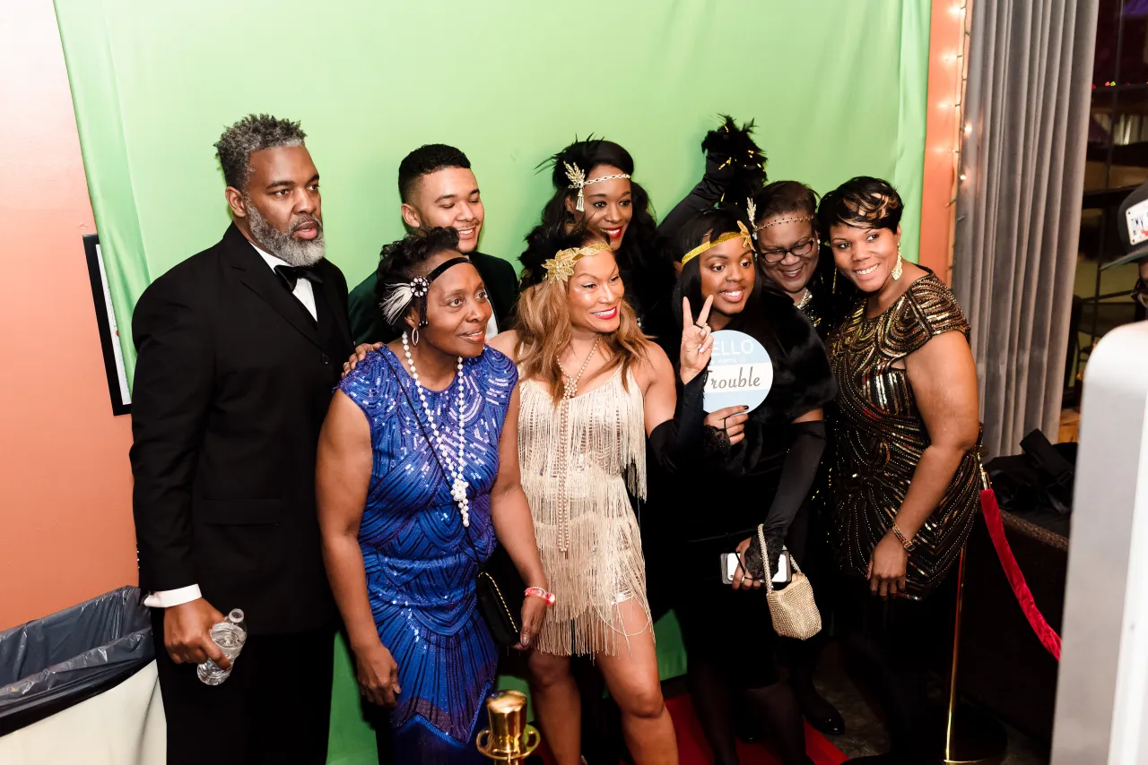 DC Lottery Staff posing for a photo in the photo booth